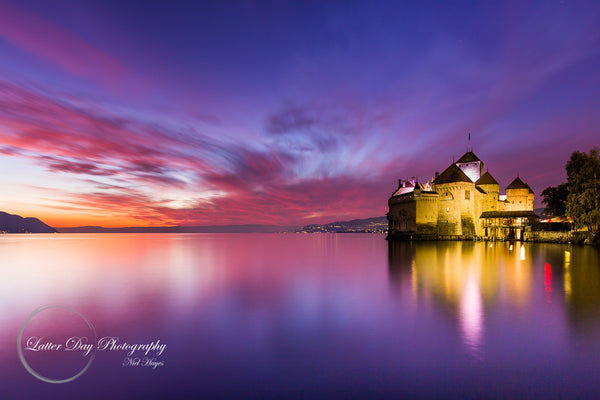 Original fine art photography print of a sunset being casted over The Chateau Chillon. This is a gorgeous castle located in the most beautiful setting imaginable, on the shores of Lake Geneva, right at the foot of the Alps. 